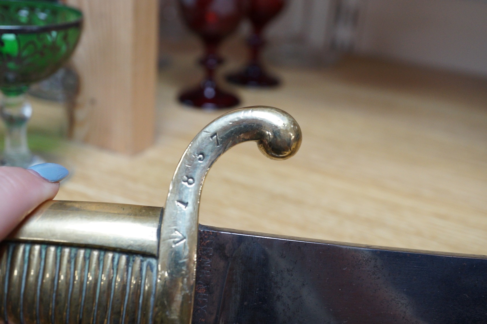 An early 19th century French sabre, the blade stamped HENRAUX, 73cm long